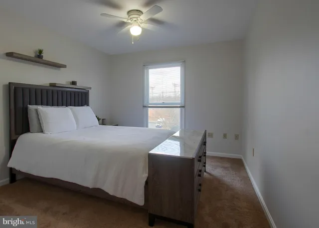 a view of a workspace with furniture