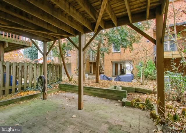 a view of yard with patio