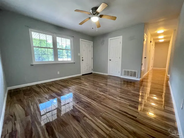 a view of an empty room and window