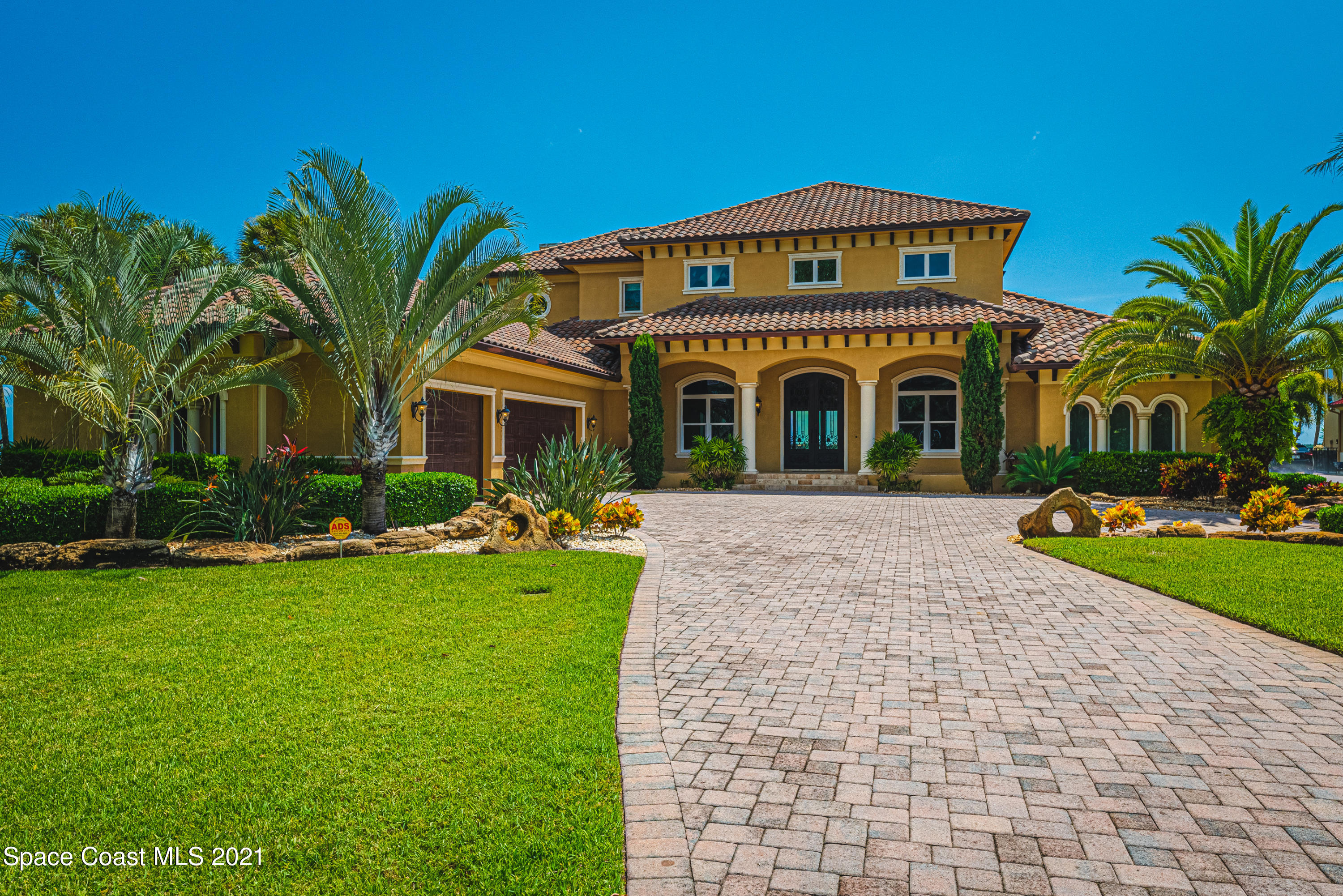 5419 Robles Lane Rockledge, FL 32955 - Photo 1 of 61 a front view of a house with garden