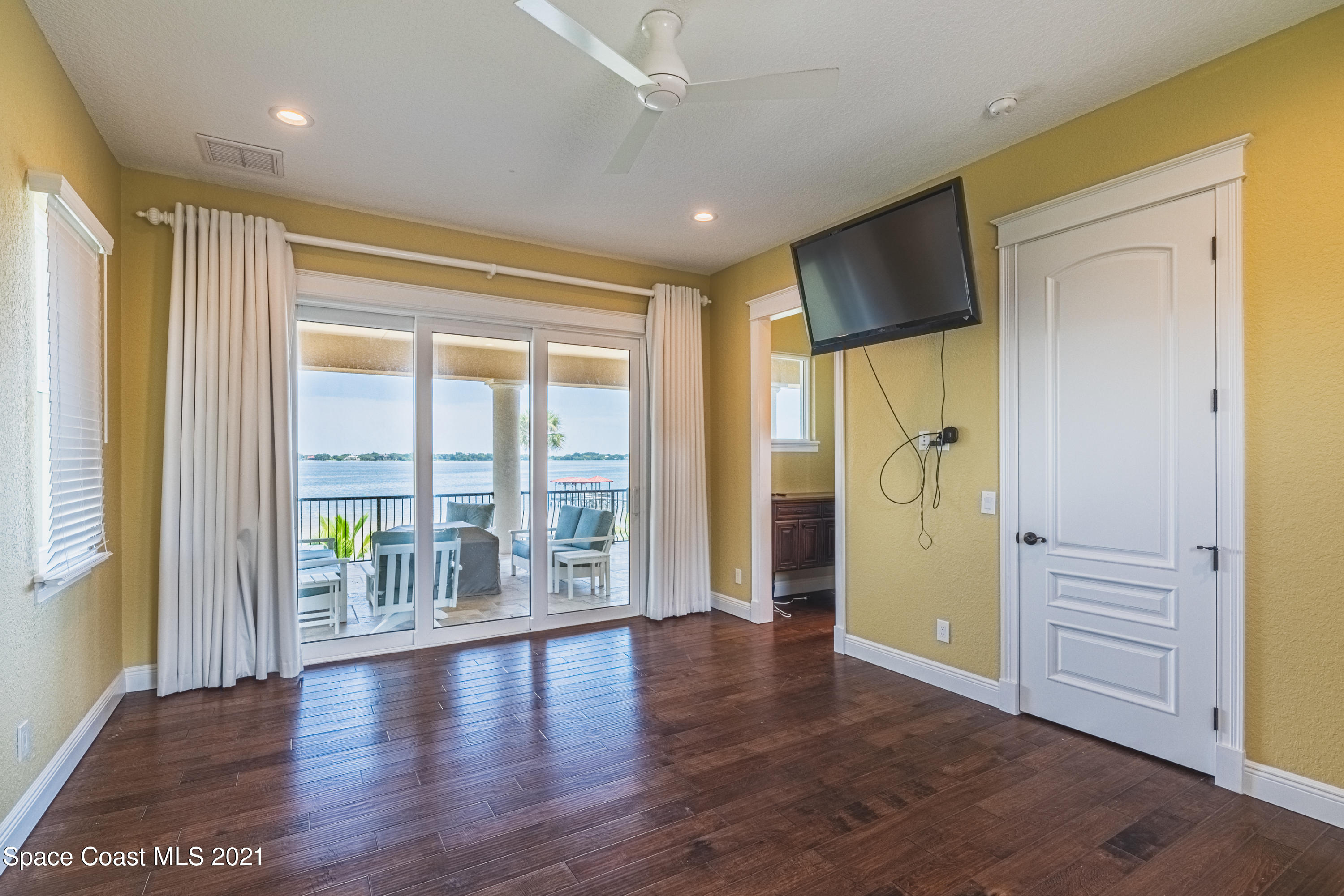 5419 Robles Lane Rockledge, FL 32955 - Photo 23 of 61 a view of entryway with wooden floor