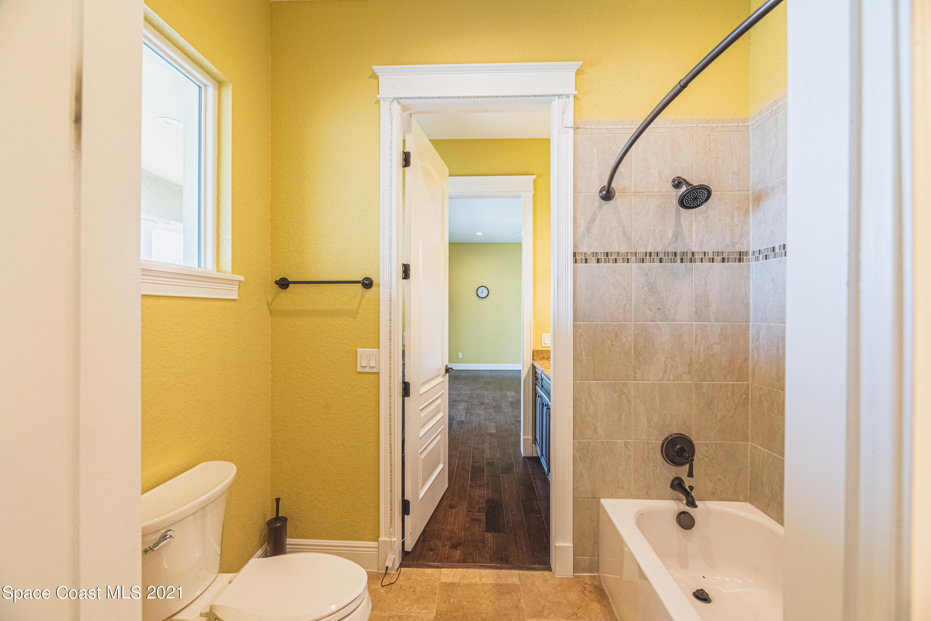 5419 Robles Lane Rockledge, FL 32955 - Photo 29 of 61 a bathroom with a sink a toilet and shower