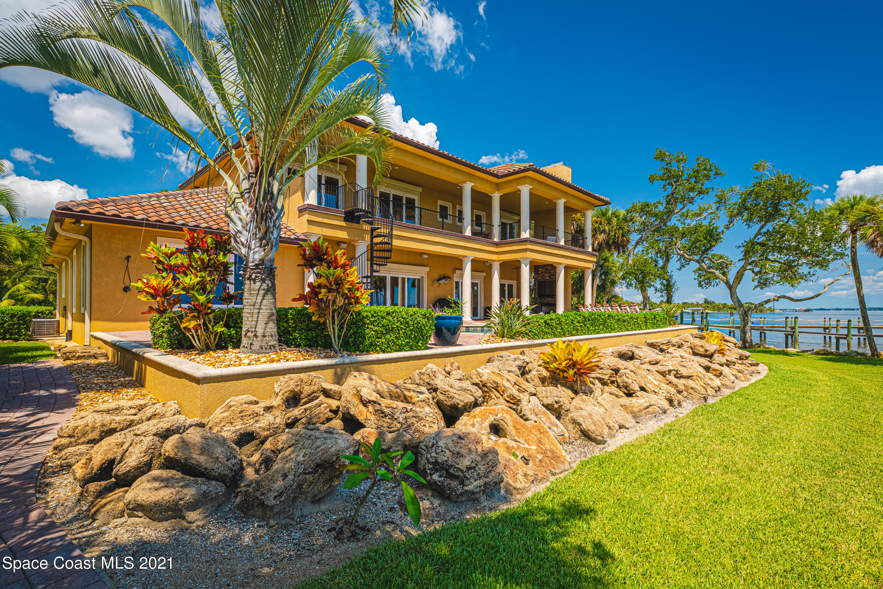 5419 Robles Lane Rockledge, FL 32955 - Photo 45 of 61 a front view of a house with a yard