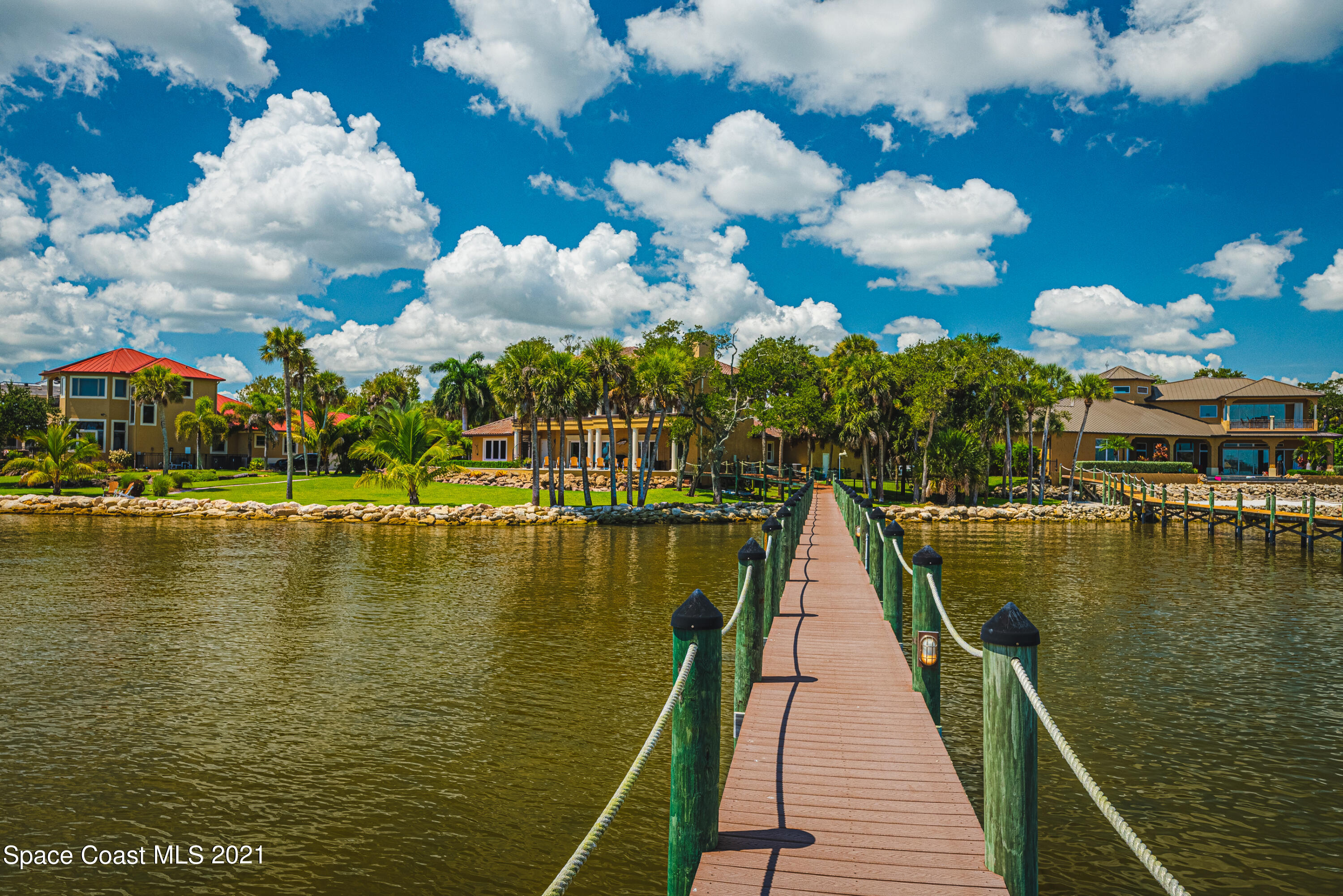 5419 Robles Lane Rockledge, FL 32955 - Photo 53 of 61 a view of a house next to a lake view