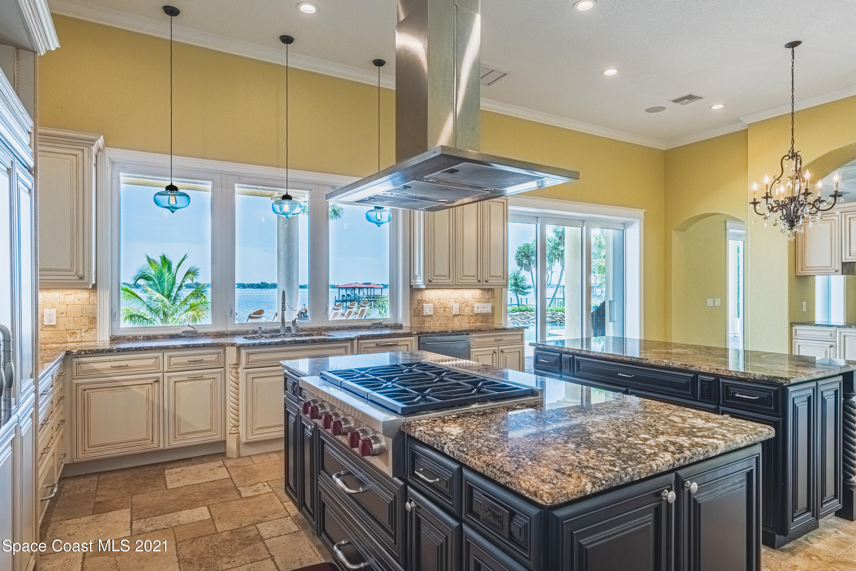 5419 Robles Lane Rockledge, FL 32955 - Photo 7 of 61 a kitchen with stainless steel appliances granite countertop a sink and a counter