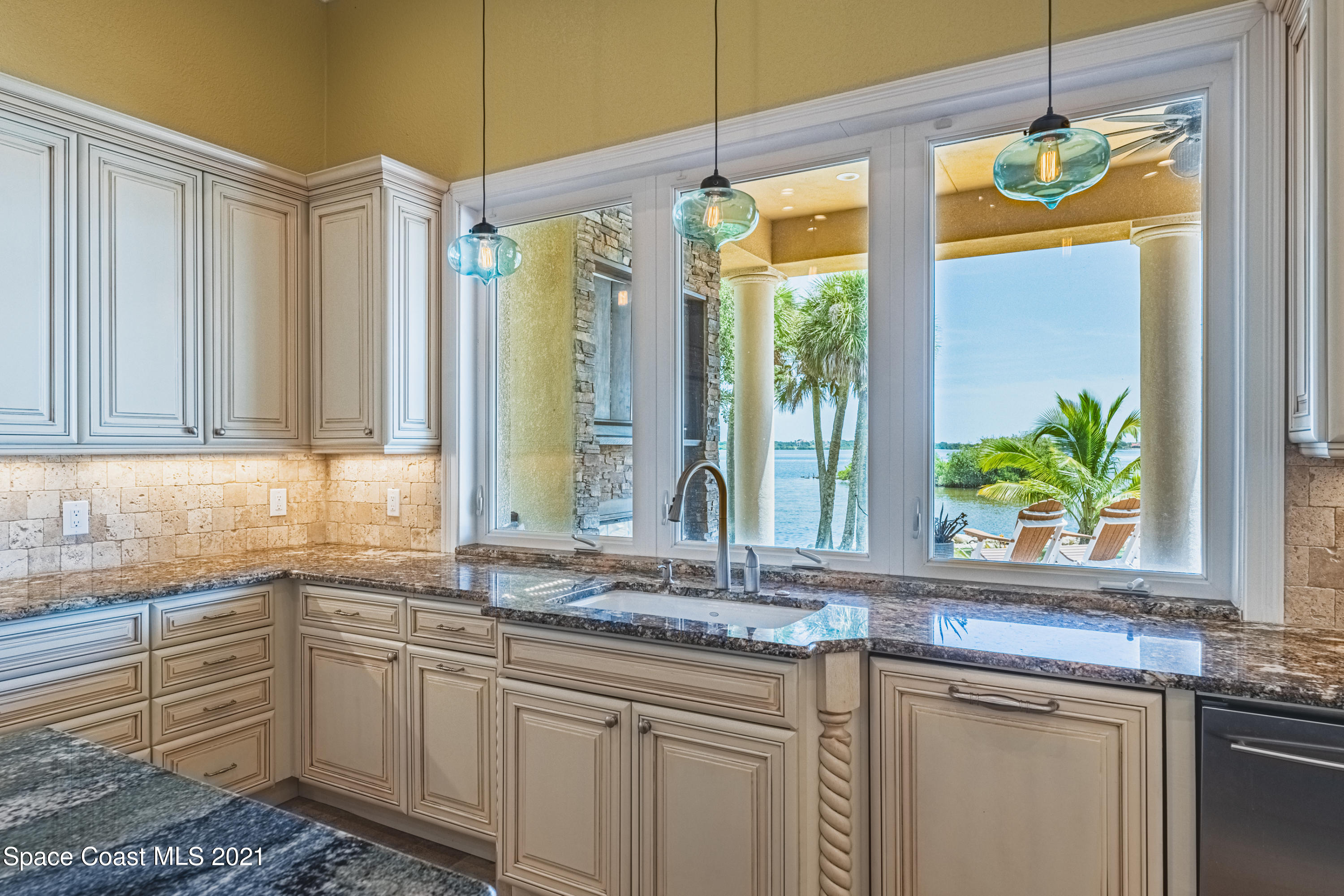 5419 Robles Lane Rockledge, FL 32955 - Photo 8 of 61 a kitchen that has a sink and a window