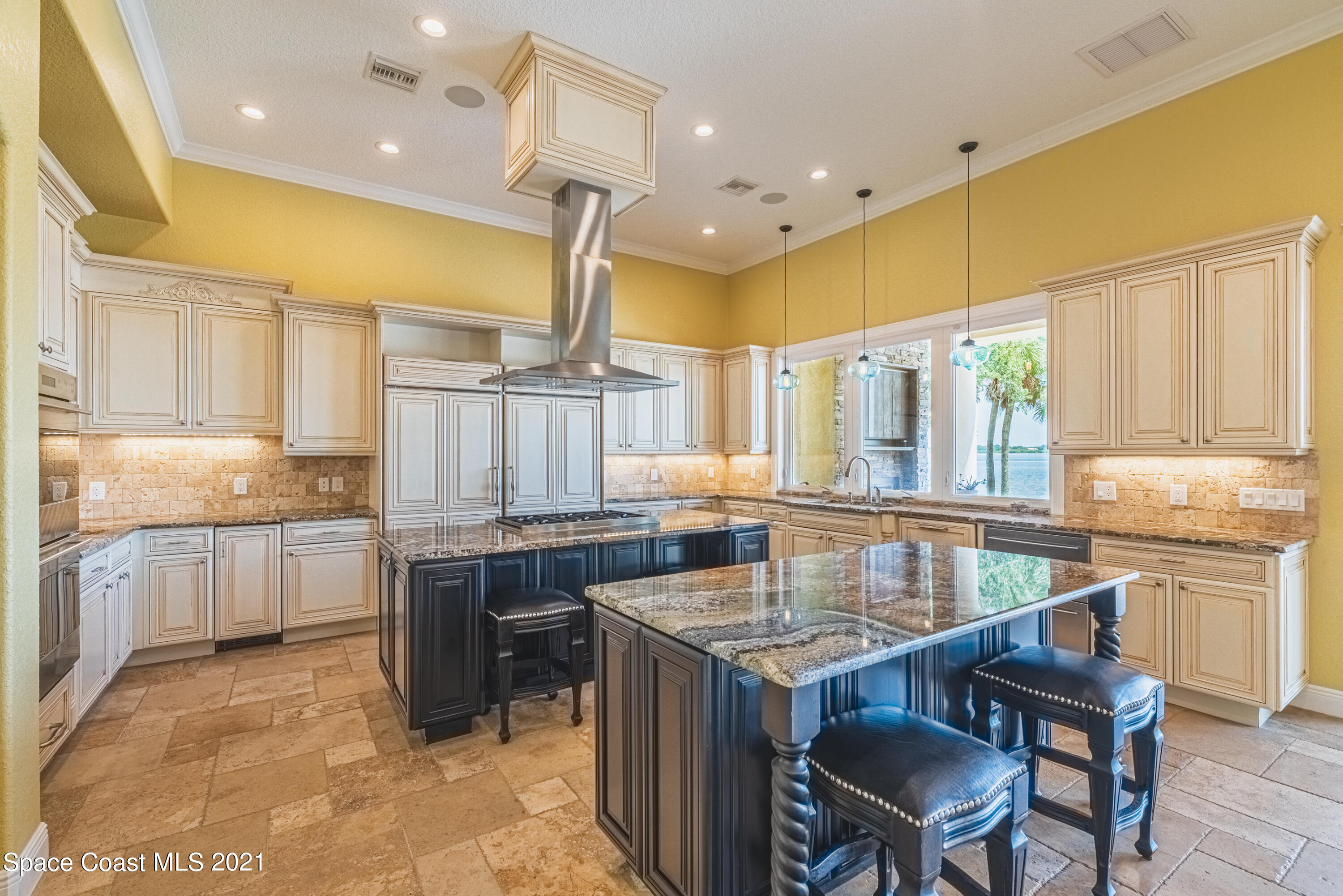 5419 Robles Lane Rockledge, FL 32955 - Photo 9 of 61 a kitchen with a stove a sink dishwasher and a refrigerator