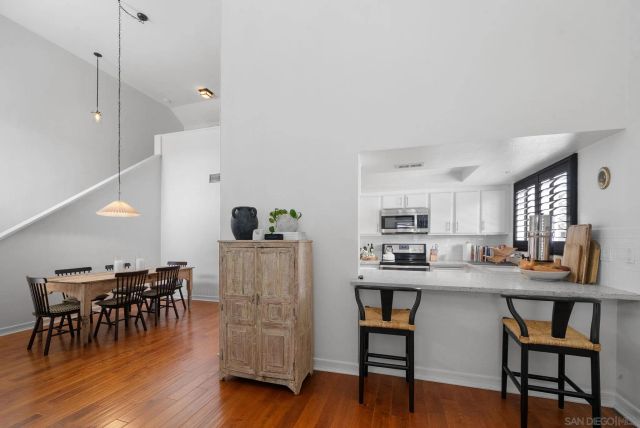 a room with furniture and wooden floor
