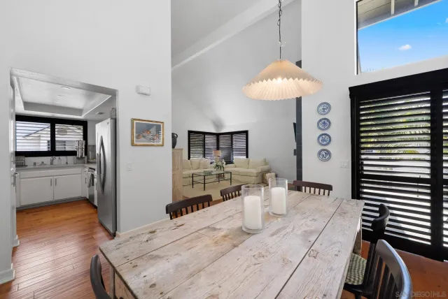 a kitchen with stainless steel appliances kitchen island granite countertop a sink and cabinets