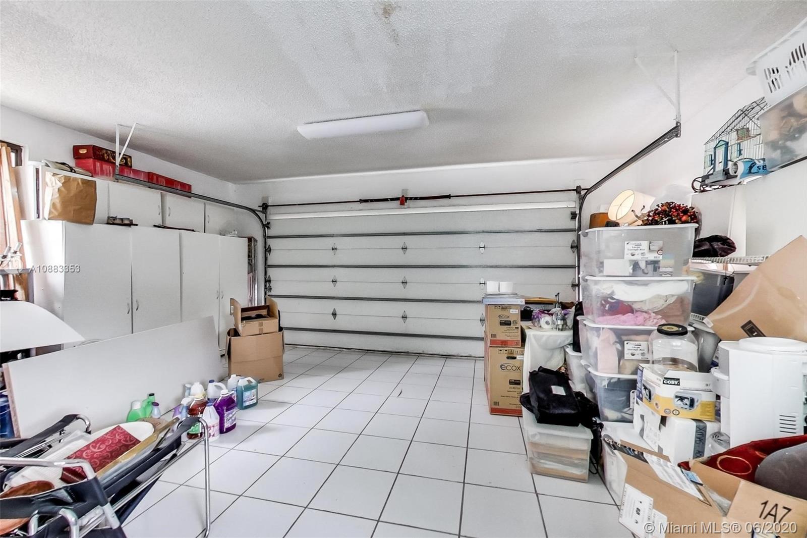 63 Southwest 31st Road Miami, FL 33129 - Photo 18 of 34 a storage room with storage and utility room