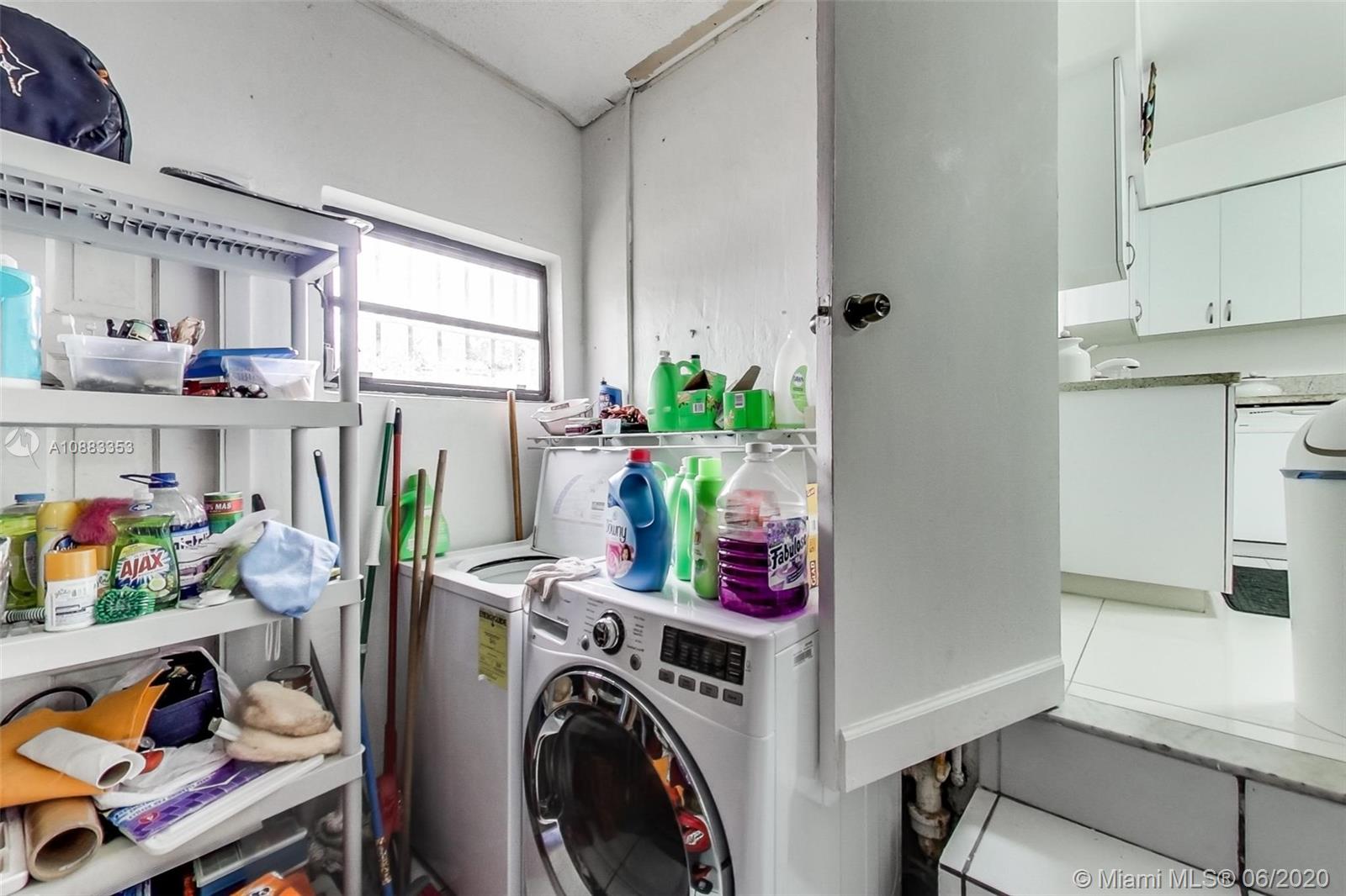 63 Southwest 31st Road Miami, FL 33129 - Photo 19 of 34 a view of storage and utility room with baby toys