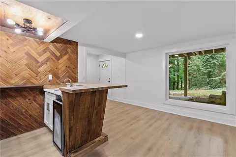 a kitchen with stainless steel appliances granite countertop a stove and a sink