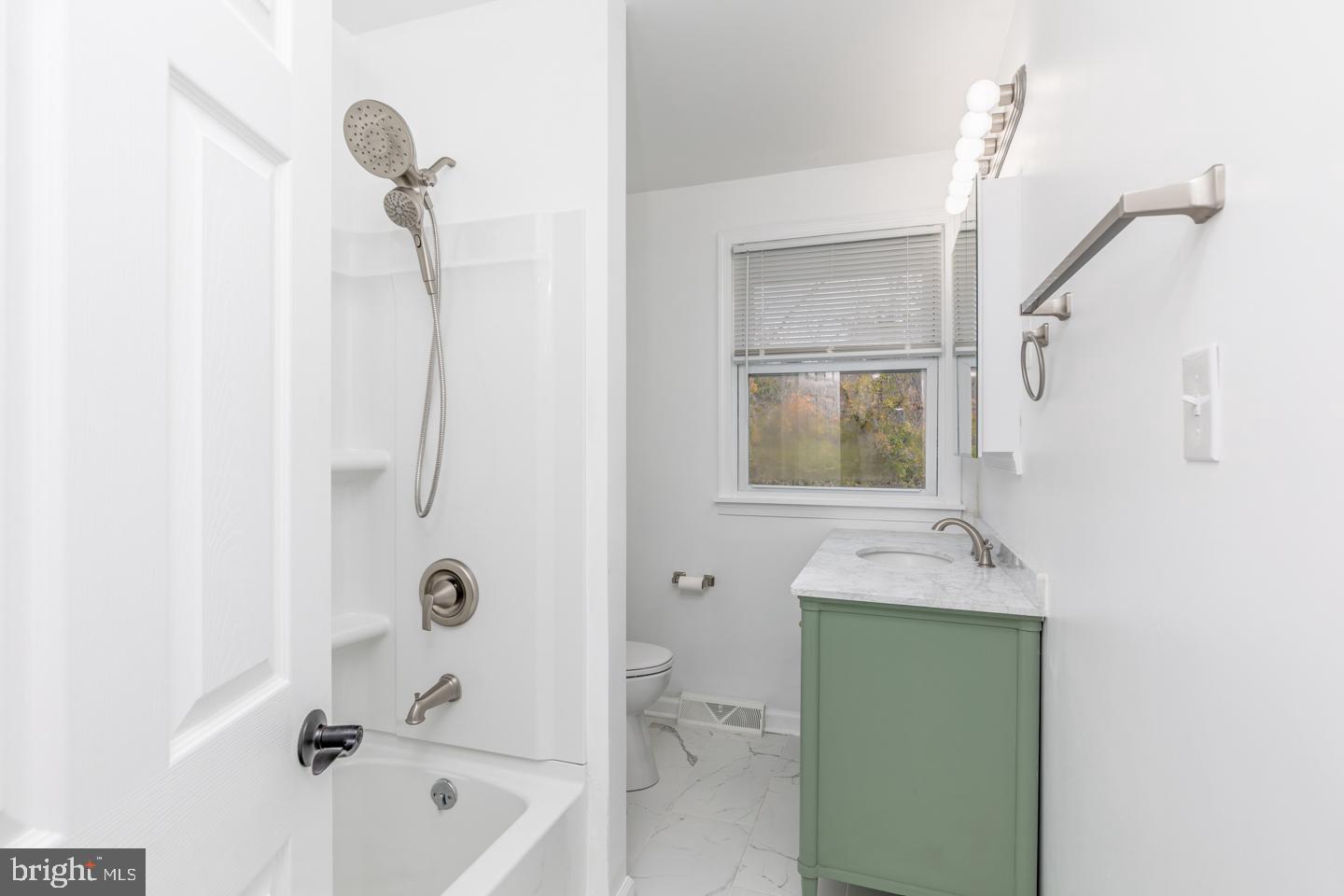238 West Center Street Clayton, NJ 08312 - Photo 12 of 30 a bathroom with a bathtub and a sink