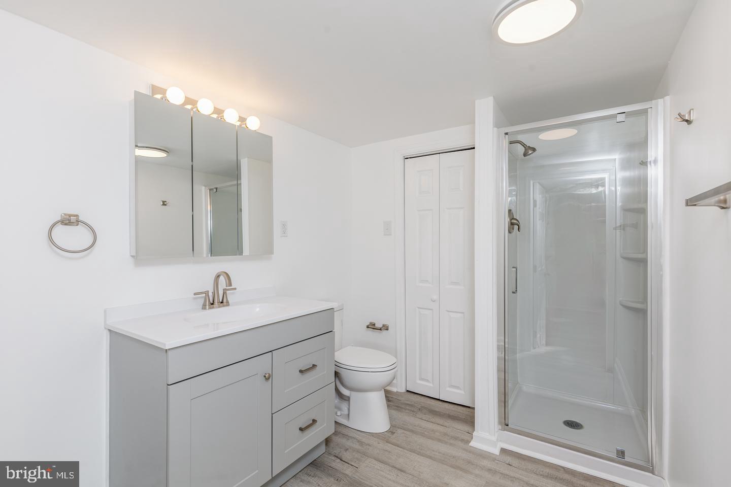 238 West Center Street Clayton, NJ 08312 - Photo 23 of 30 a bathroom with a double vanity sink mirror and toilet