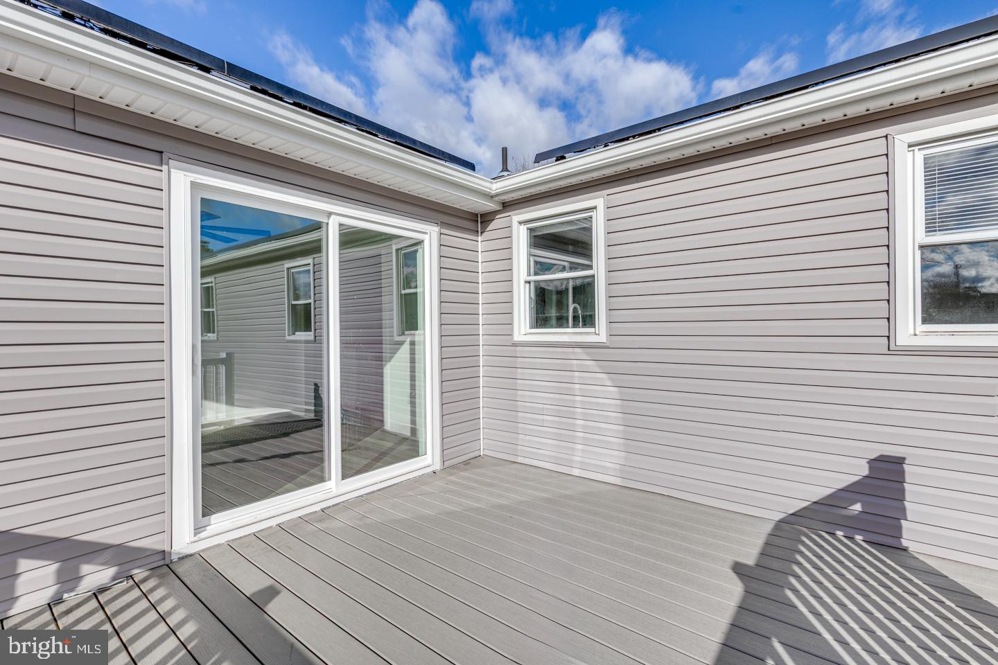 238 West Center Street Clayton, NJ 08312 - Photo 28 of 30 a view of a balcony with wooden floor