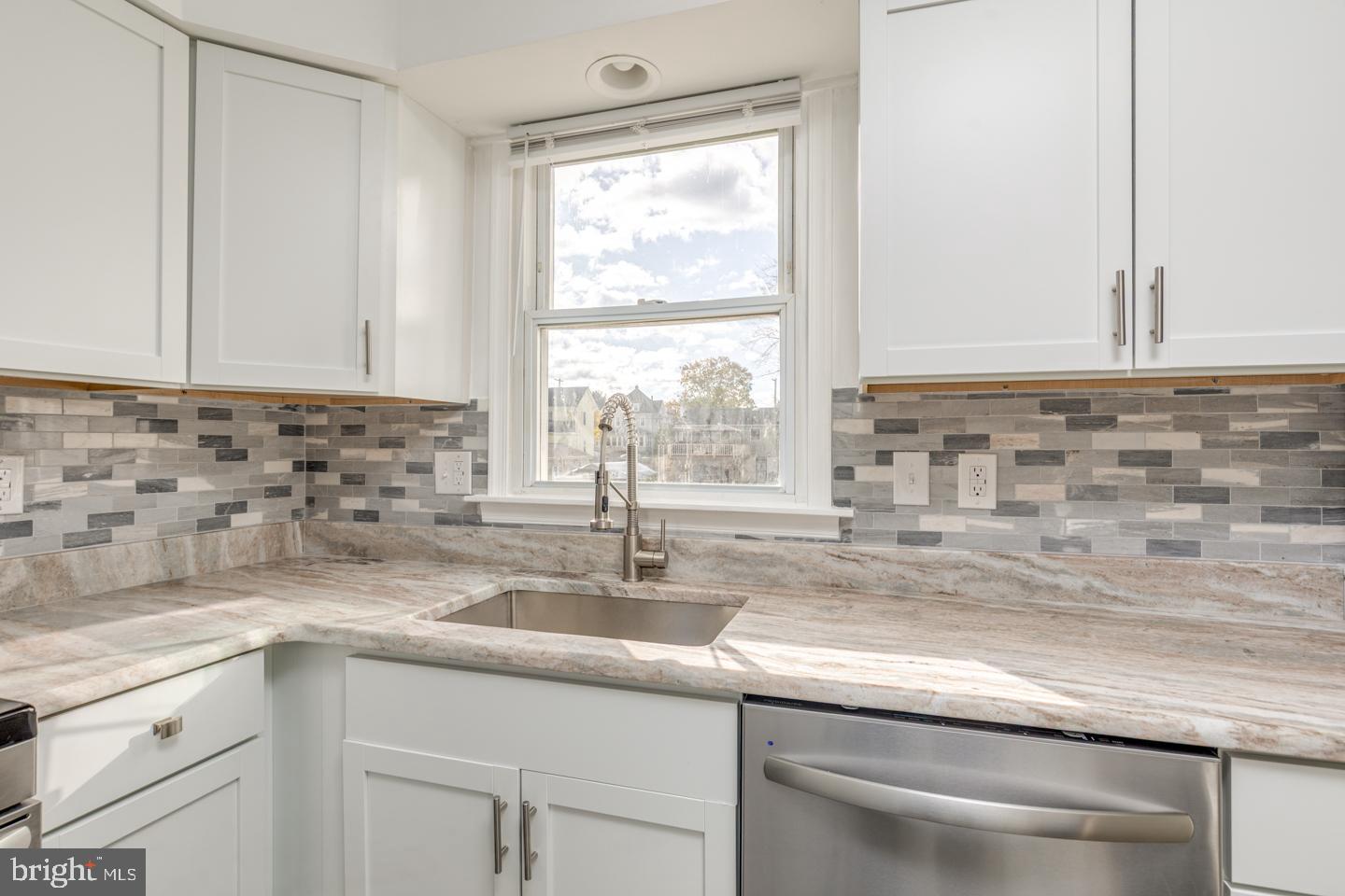 238 West Center Street Clayton, NJ 08312 - Photo 7 of 30 a kitchen with appliances cabinets and a sink