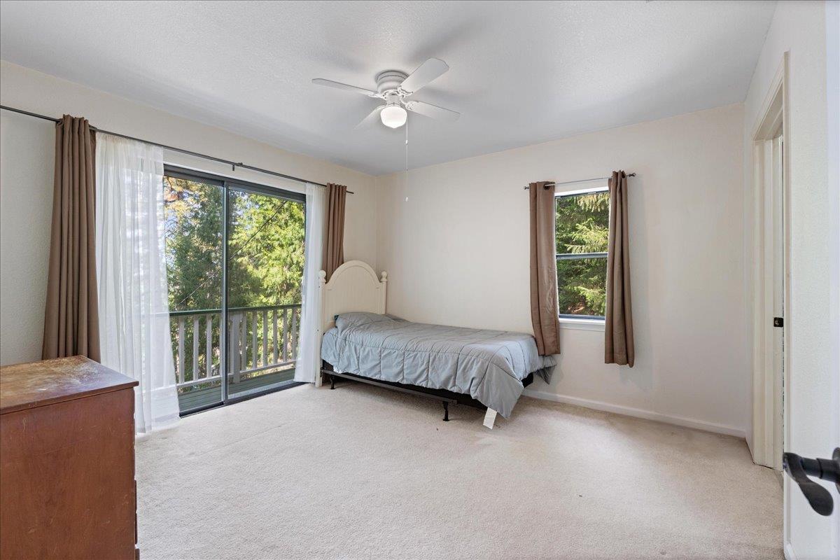 5360 Pine Ridge Drive Grizzly Flats, CA 95636 - Photo 24 of 36 a bedroom with a bed and a window
