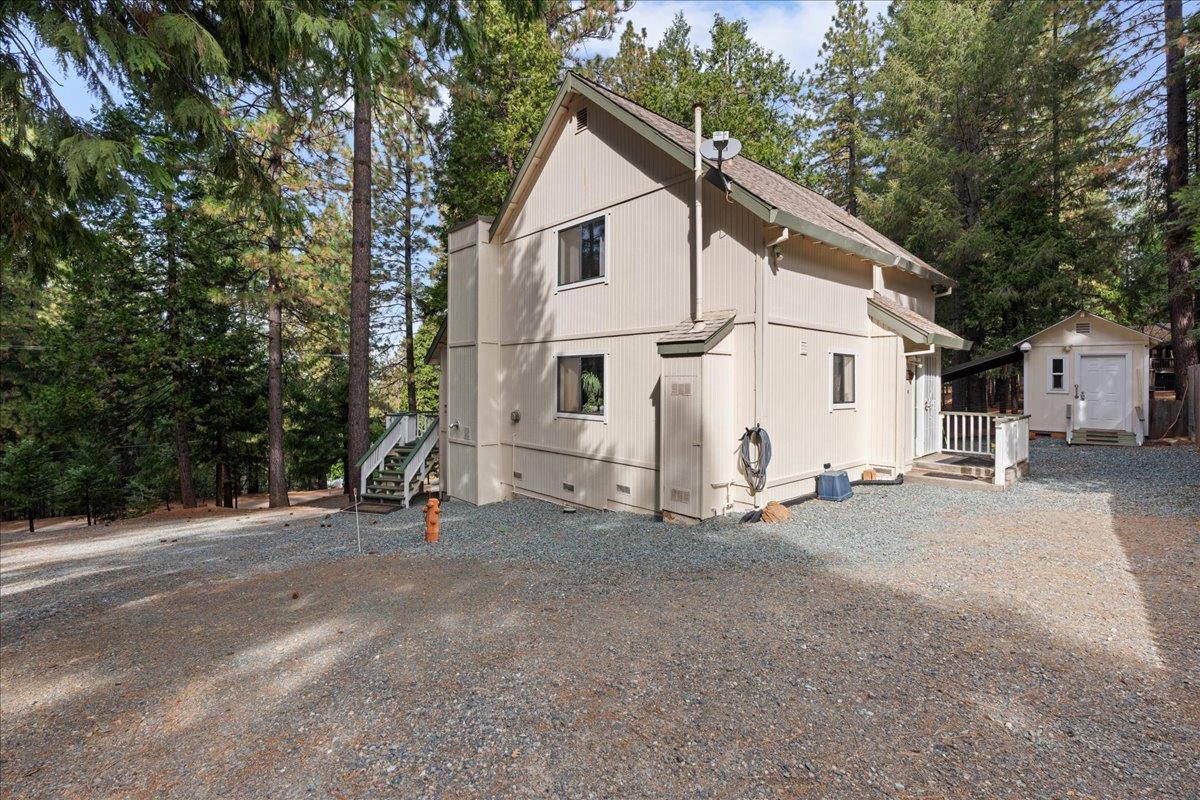 5360 Pine Ridge Drive Grizzly Flats, CA 95636 - Photo 35 of 36 a view of a house with a yard