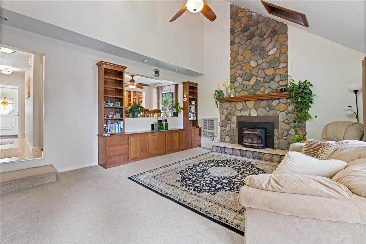 5360 Pine Ridge Drive Grizzly Flats, CA 95636 - Photo 9 of 36 a living room with furniture and a fireplace
