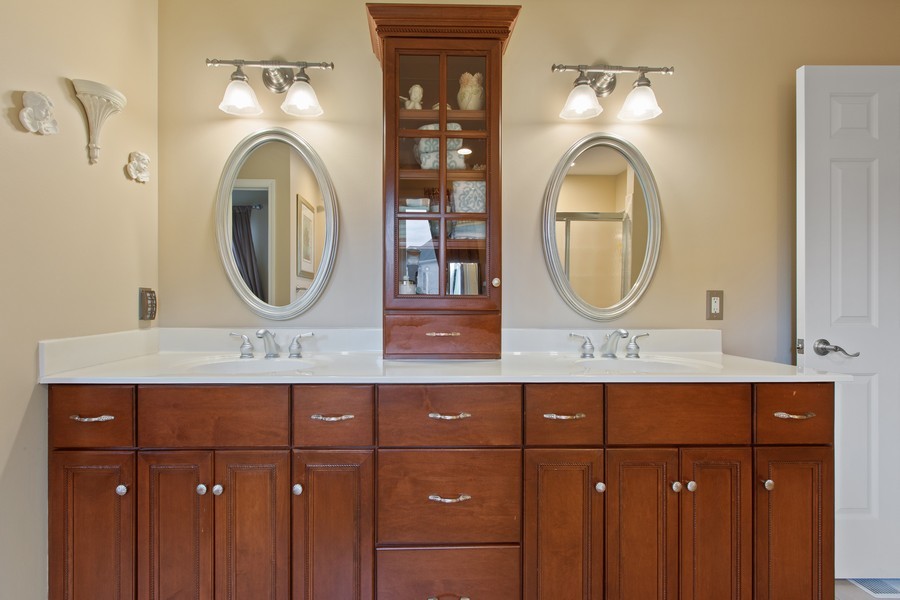 1 Walnut Lane Sugar Grove, IL 60554 - Photo 17 of 35 a bathroom with a sink and a mirror