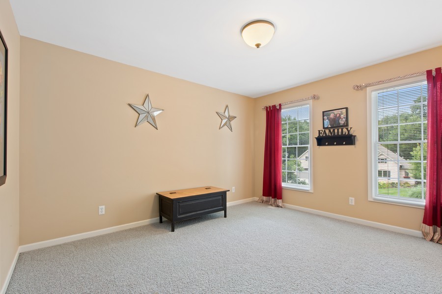 1 Walnut Lane Sugar Grove, IL 60554 - Photo 20 of 35 a view of an empty room with furniture and windows