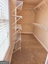 a view of a room with racks on the wall