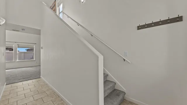 a view of entryway with stairs