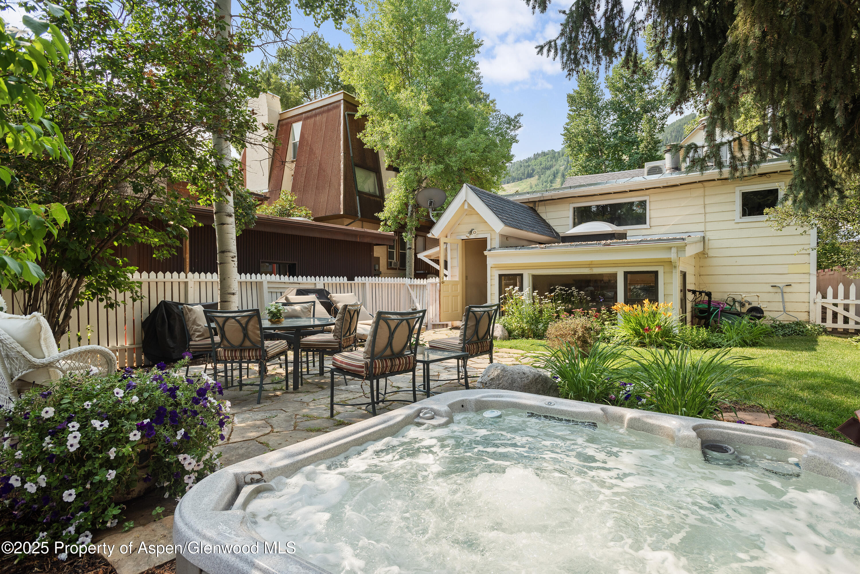 214 West Hyman Avenue Aspen, CO 81611 - Photo 19 of 21 a view of a house with patio