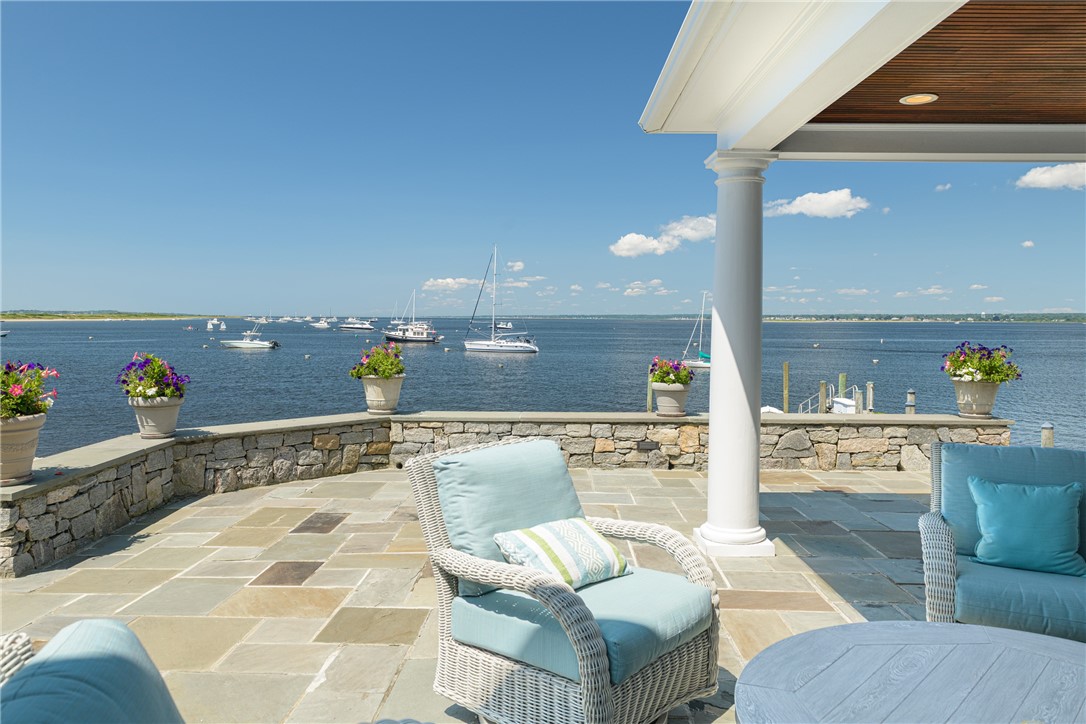 5 Waters Edge Road Westerly, RI 02891 - Photo 17 of 47 A covered porch allows one to enjoy the sparkling ocean shaded by the sun!