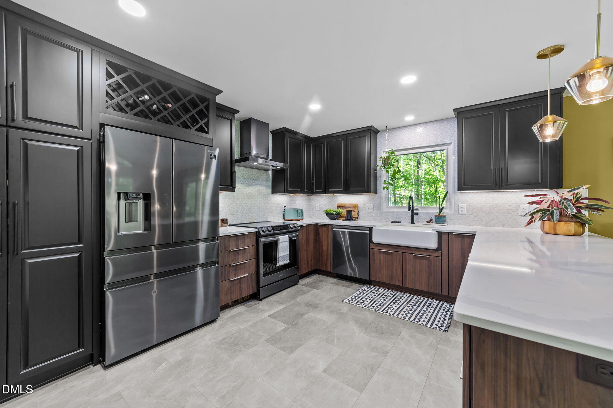 105 Barcliff Terrace Cary, NC 27518 - Photo 7 of 47 a kitchen with granite countertop stainless steel appliances a refrigerator sink and microwave