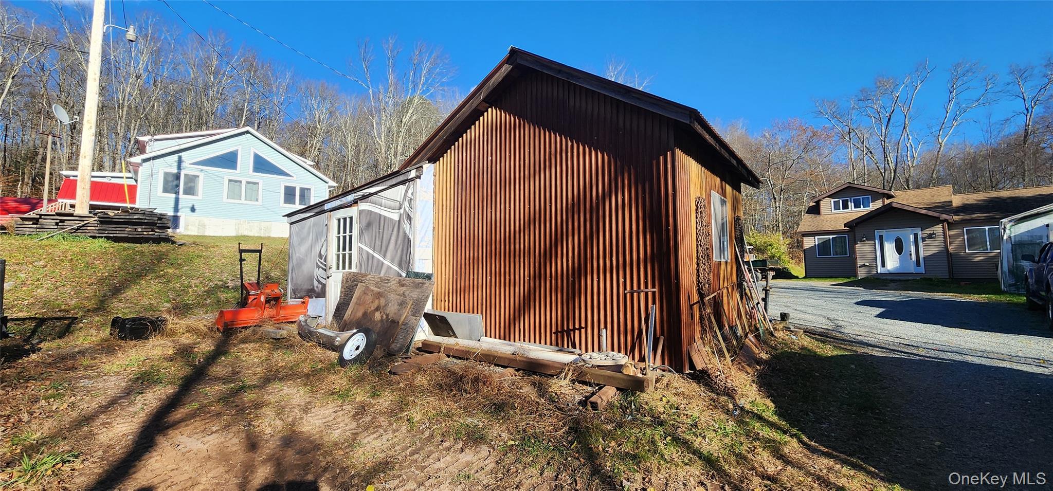 371 Kelly Bridge Road, Unit 365 Swan Lake, NY 12783 - Photo 21 of 21 a view of house with yard