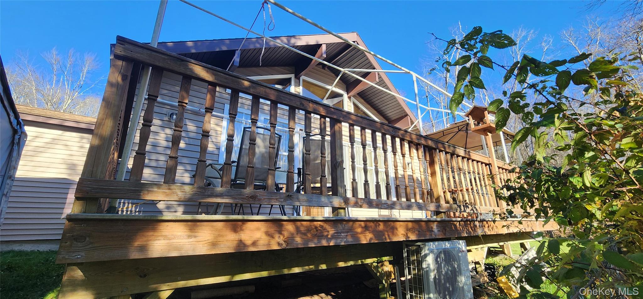 371 Kelly Bridge Road, Unit 365 Swan Lake, NY 12783 - Photo 5 of 21 a view of balcony with a outdoor space