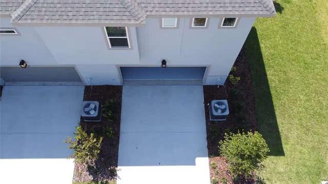 a view of a swimming pool with an outdoor seating