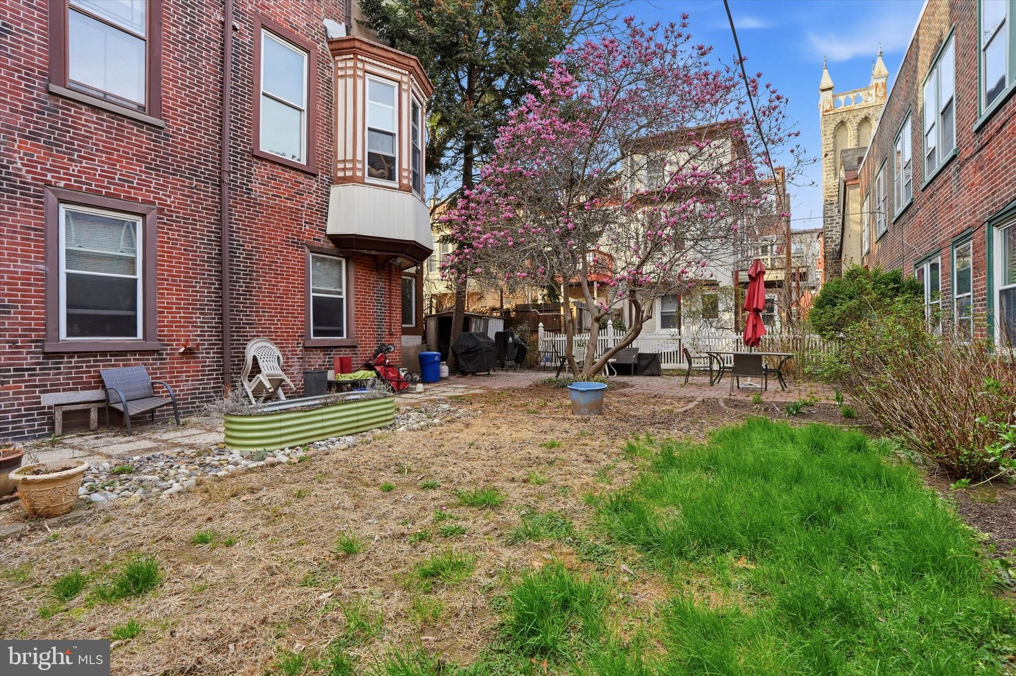 1713 Green Street, Unit 5 Philadelphia, PA 19130 - Photo 14 of 15 a front view of a building with street view and trees