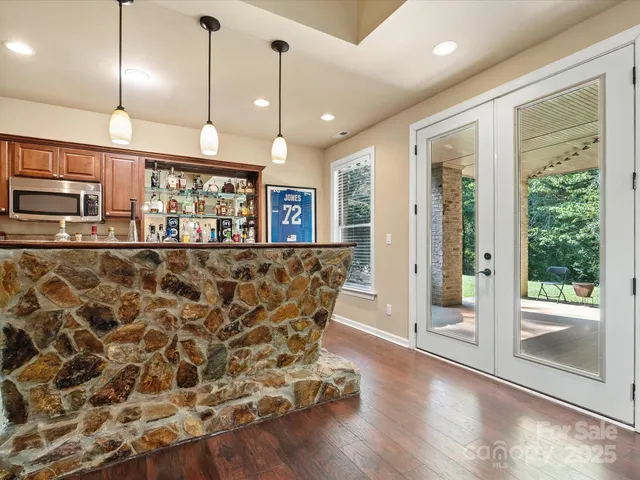 a view of a living room and a chandelier