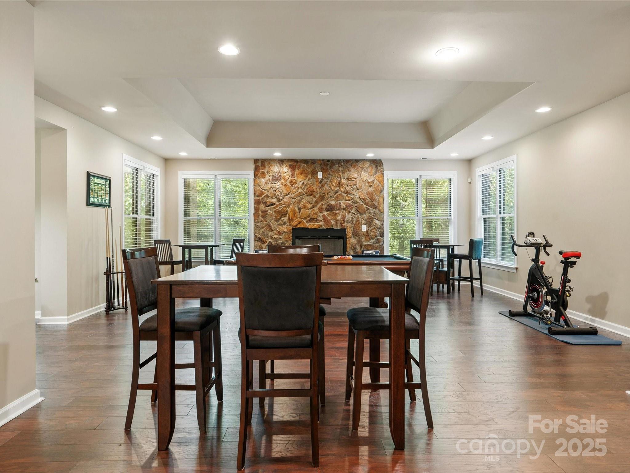 8407 Rolling Fields Road Mint Hill, NC 28227 - Photo 38 of 48 a view of a dining room with furniture window and wooden floor