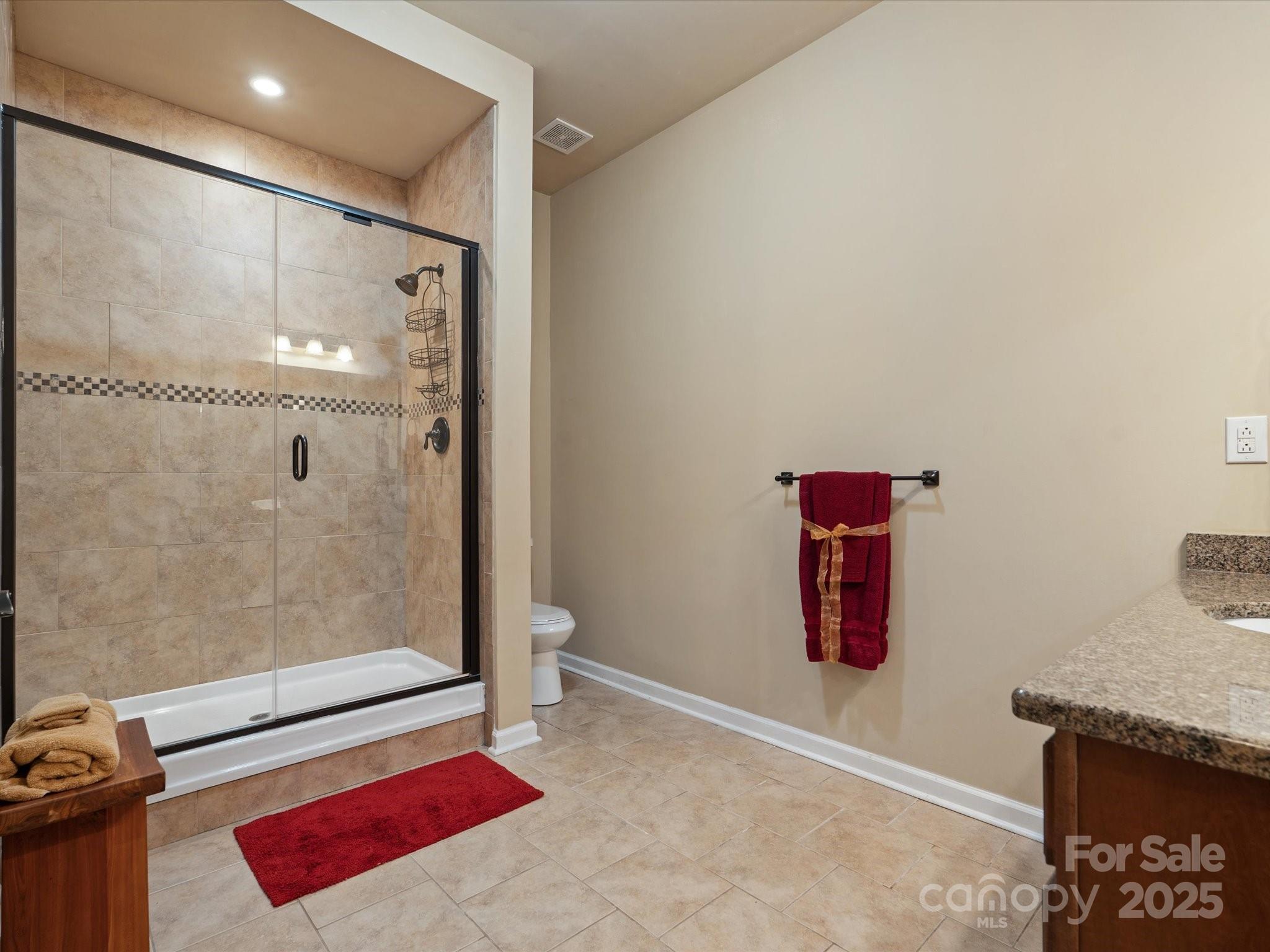 8407 Rolling Fields Road Mint Hill, NC 28227 - Photo 41 of 48 a bathroom with a shower