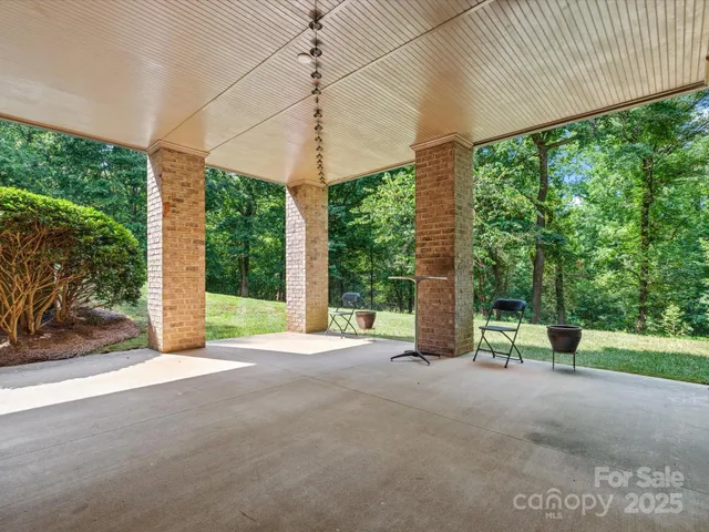 a view of a room with porch and wooden floor