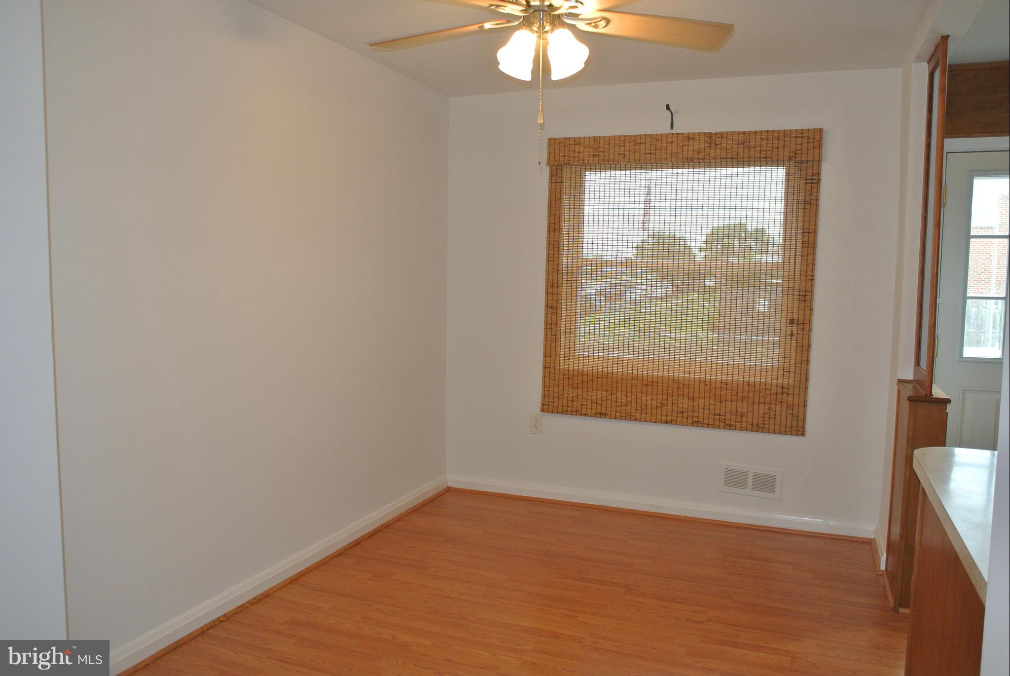 2700 Moorgate Road Baltimore, MD 21222 - Photo 3 of 27 a view of an empty room with a window