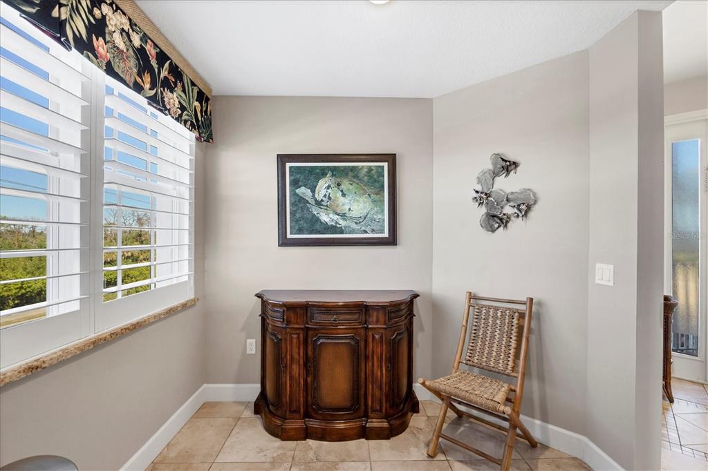 13113 Gasparilla Road, Unit A305 Placida, FL 33946 - Photo 11 of 29 a view of a livingroom with furniture and windows