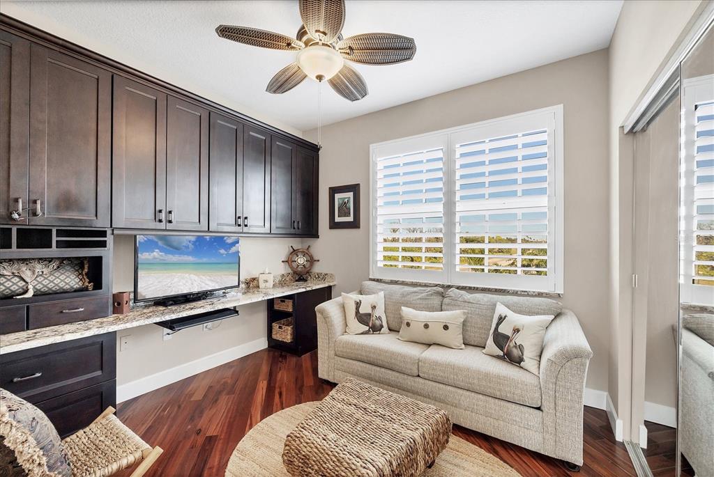 13113 Gasparilla Road, Unit A305 Placida, FL 33946 - Photo 21 of 29 a living room with furniture flat screen tv and window