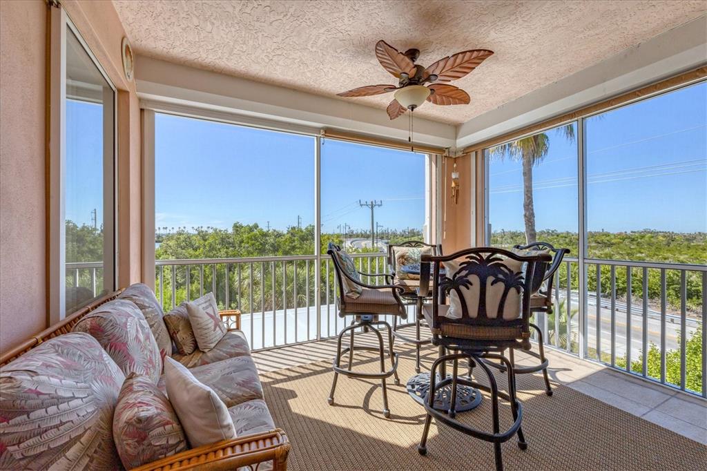 13113 Gasparilla Road, Unit A305 Placida, FL 33946 - Photo 25 of 29 a work room with furniture and a window