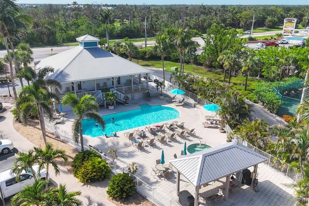 13113 Gasparilla Road, Unit A305 Placida, FL 33946 - Photo 28 of 29 an aerial view of a house with garden space and street view