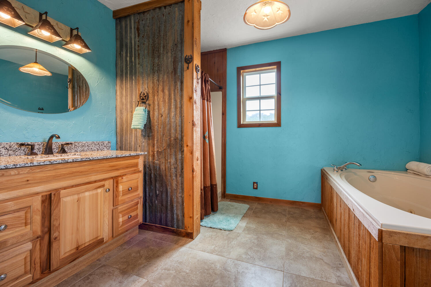 3487 Rust Spring Branch, TX 78070 - Photo 15 of 40 En suite primary bath featuring a walk-in shower and separate soaking tub.