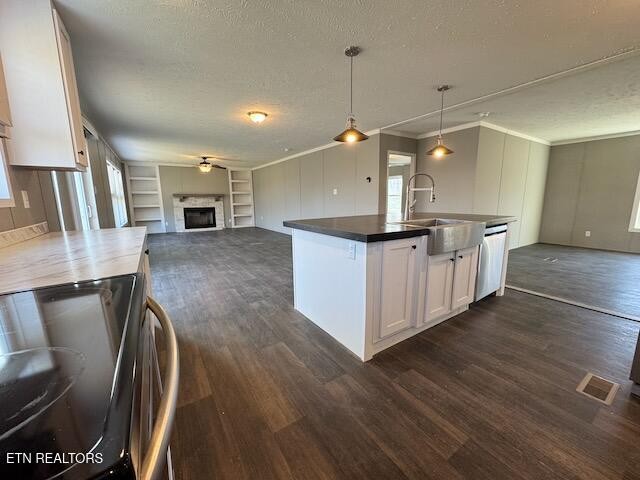 313 Salem Road McMinnville, TN 37110 - Photo 12 of 52 a kitchen with stainless steel appliances granite countertop a sink a stove and a wooden floors