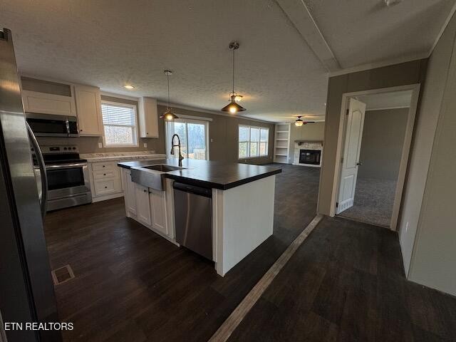 313 Salem Road McMinnville, TN 37110 - Photo 15 of 52 a kitchen with stainless steel appliances granite countertop a stove a sink and a refrigerator