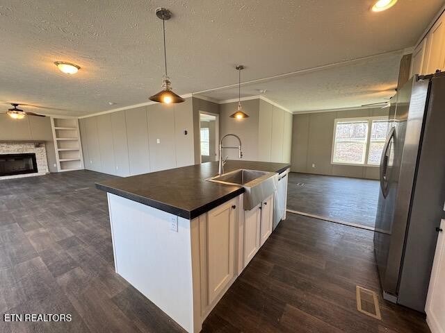 313 Salem Road McMinnville, TN 37110 - Photo 3 of 52 a kitchen with stainless steel appliances granite countertop a sink a counter space and wooden floor
