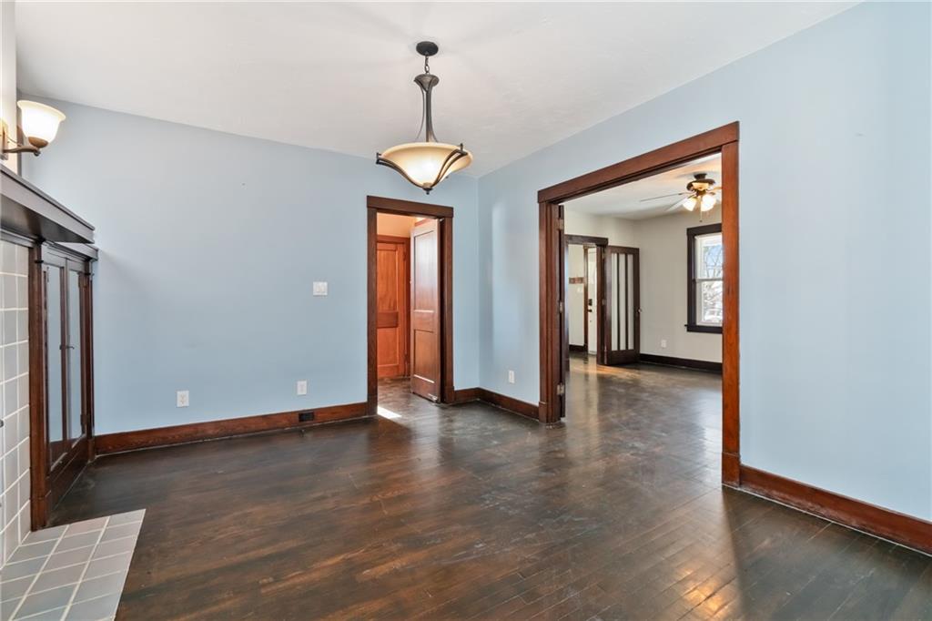 3409 Brownsville Road Pittsburgh, PA 15227 - Photo 11 of 28 a view of an empty room with wooden floor and a window
