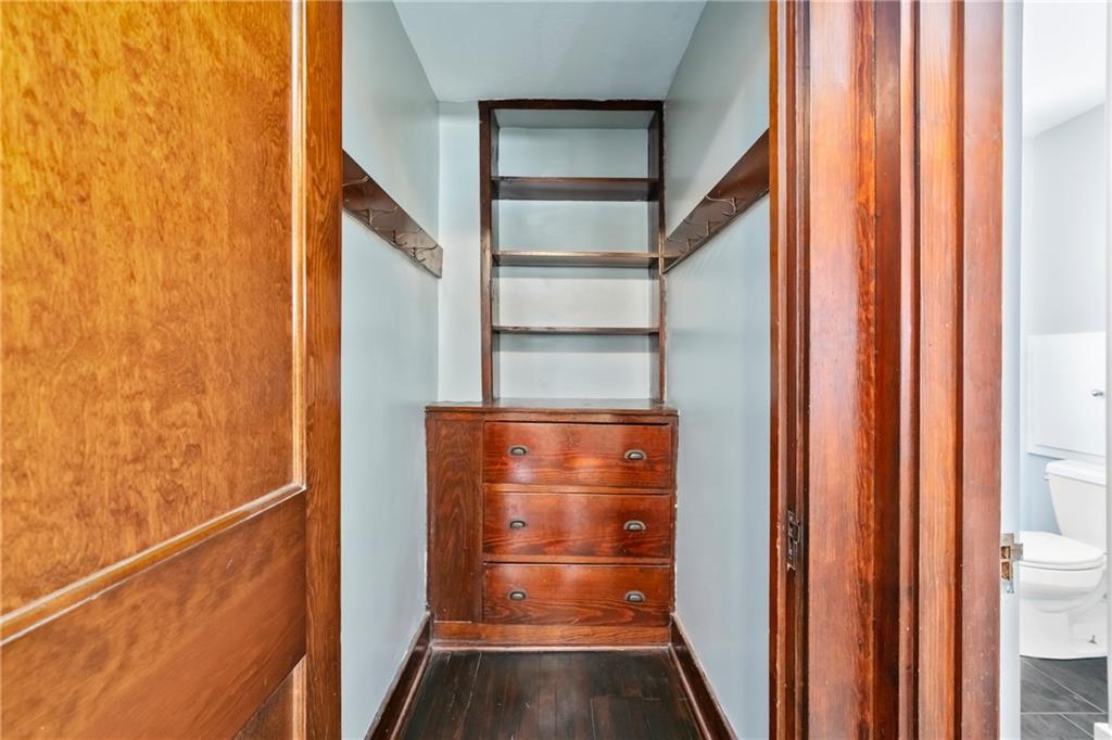 3409 Brownsville Road Pittsburgh, PA 15227 - Photo 19 of 28 a view of water heater room with wooden floor