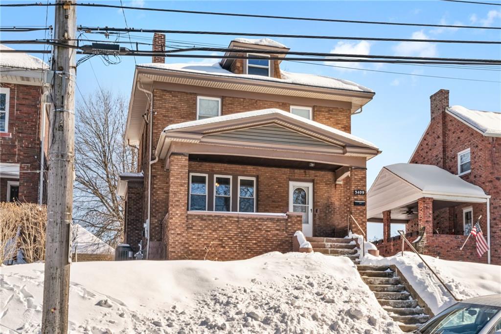 3409 Brownsville Road Pittsburgh, PA 15227 - Photo 3 of 28 a view of a house with a yard